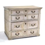 A Jacobean limed oak chest of four graduated drawers with geometric moulding's on block feet, w.