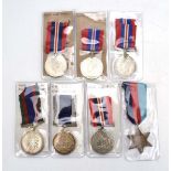 A group of Second World War medals including a Royal Navy Long Service & Good Conduct medal,