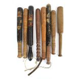 A collection of eight various turned truncheons including two with VR cyphers together with 'The