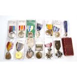 A group of International medals and medallions including UN Korea Medal, Rhodesian GSM,