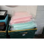 Crate of coloured paper