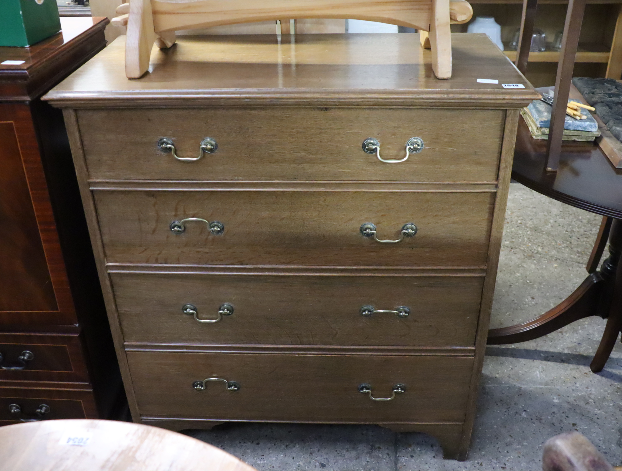 Oak chest of 4 drawers with brass handles