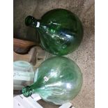 2 green glass carbuoys