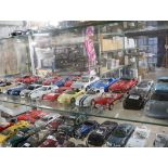 Shelf of die cast sports cars