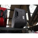 Grey soft shell wheeled luggage case