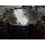 Ornamental brass platter side table on wooden folding stand