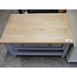 Light grey TV stand with oak surface