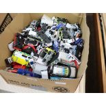 Box containing large quantity of die cast emergency service vehicles