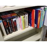 Shelf of various books