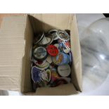 Small box containing pin badges
