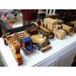 Collection of 7 hand made wooden vehicles