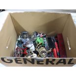 Box containing motorbike models, locomotives and other die cast transport