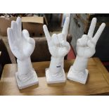 3 gesturing ceramic hands