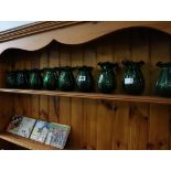 9 green glass vases