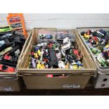 Crate containing pre loved and unused die cast vehicles incl. F1 cars and rally cars