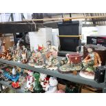 Shelf of mixed ornaments and collectibles incl. Capodimonte Leonardo coloured glass, copper jugs,