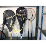 2 tennis rackets with 3 badminton rackets