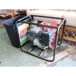 Honda WB20XT petrol generator with black tub of accessories