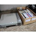 JVC VCR player with box of DVDs, CDs and cassettes