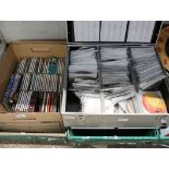 Crate of CDs and flight case of loose CDs