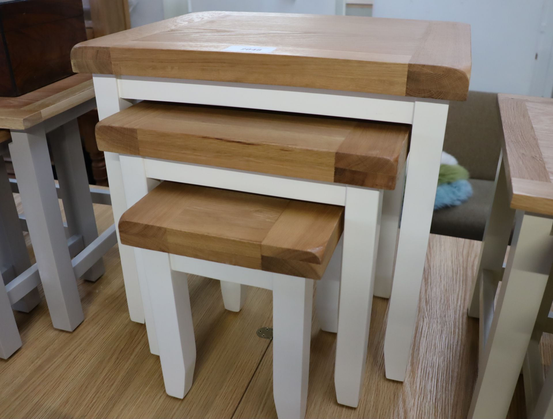 White nest of 3 oak top coffee tables