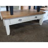 Low level beige coffee table with 2 drawers