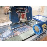 Shelf of Chelsea FC memorabilia incl. bag, pictures baring signatures and mat