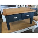 Dark blue coffee table with 2 drawers and oak surface