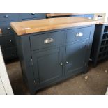 Small dark blue 2 drawer sideboard with double door cupboard beneath and oak surface