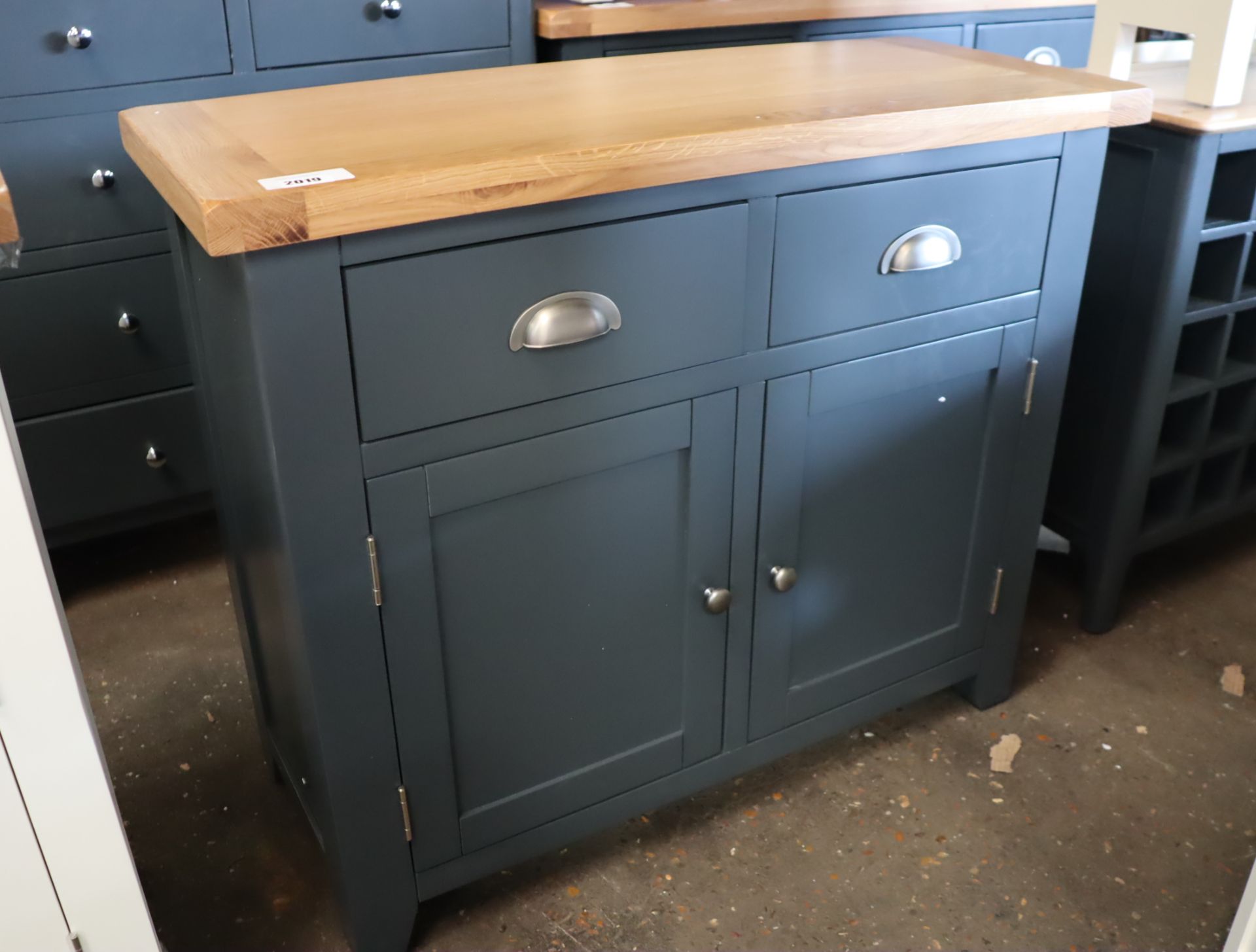 Small dark blue 2 drawer sideboard with double door cupboard beneath and oak surface