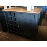 Dark blue open front wine storage unit with single door cupboard, single drawer and oak surface
