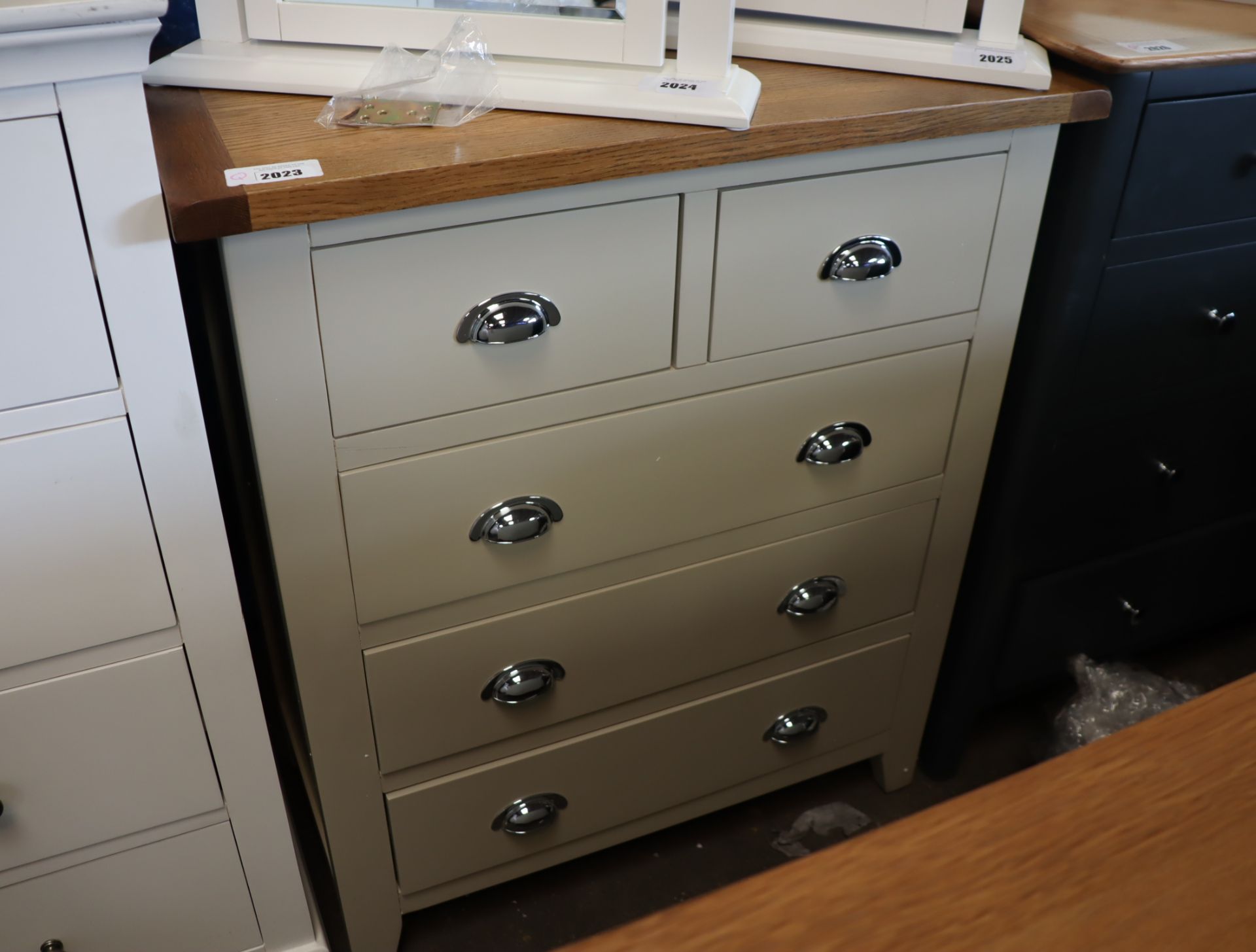 Mocha coloured chest of 2 over 3 drawers with oak surface