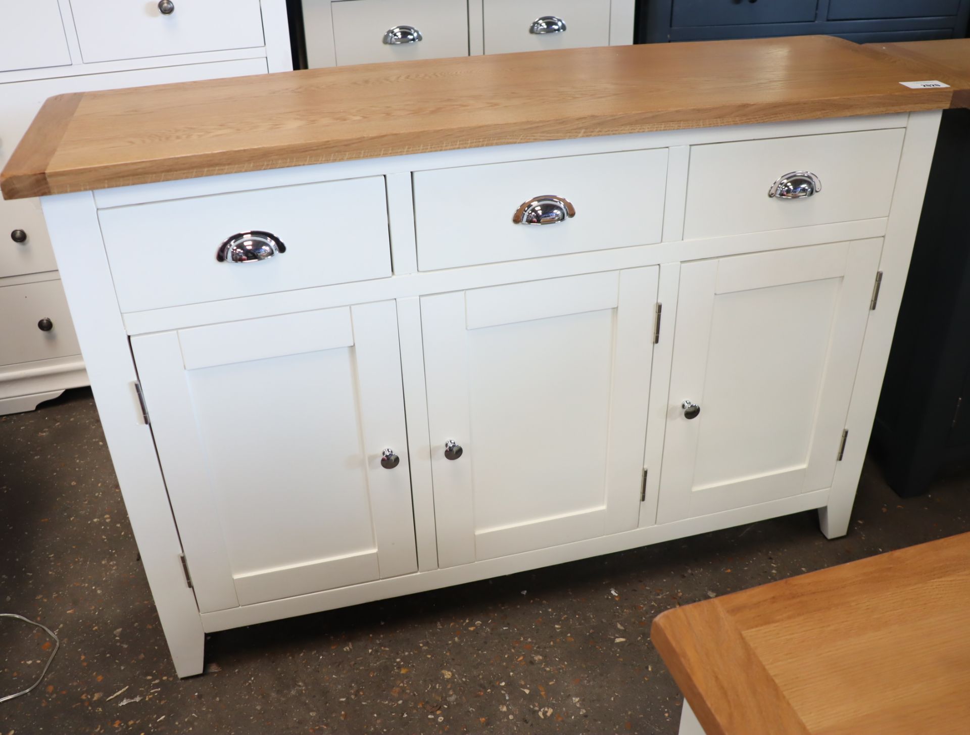 Off-white sideboard with 3 drawers, 3 cupboards and oak surface