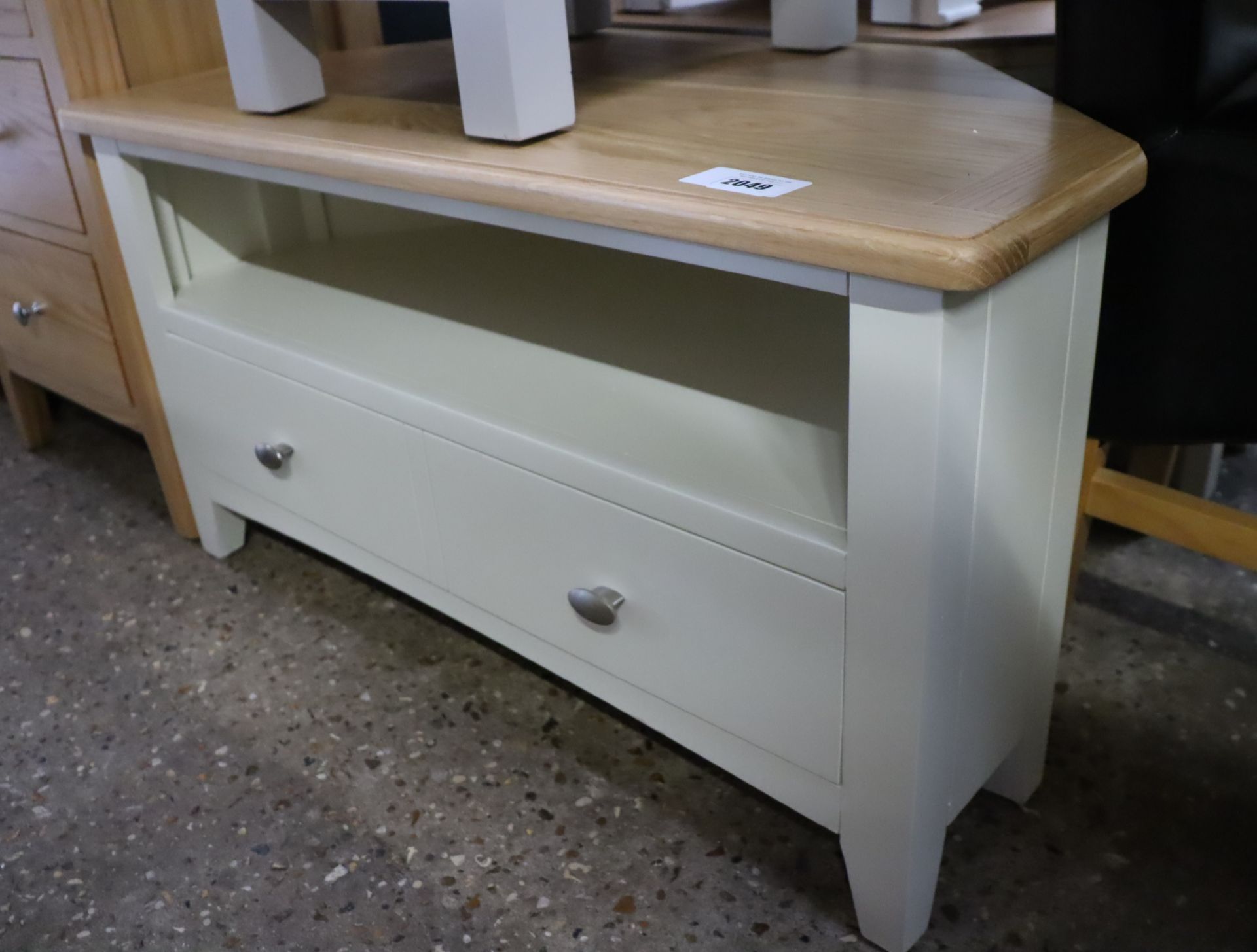 Off-white entertainment unit with oak surface