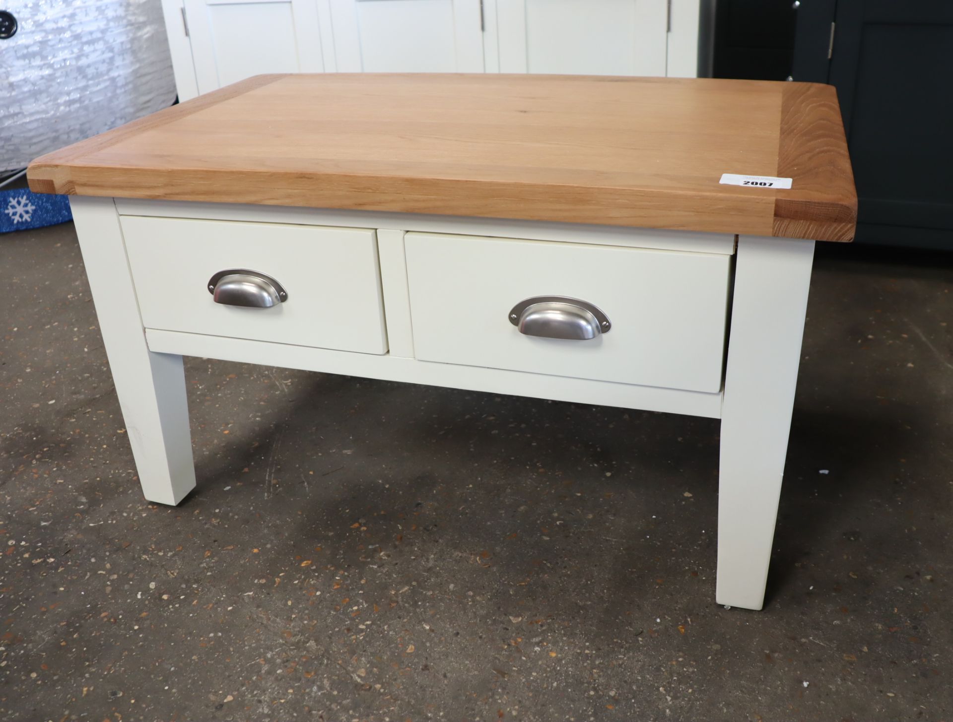 Off-white coffee table with 2 drawers and oak surface