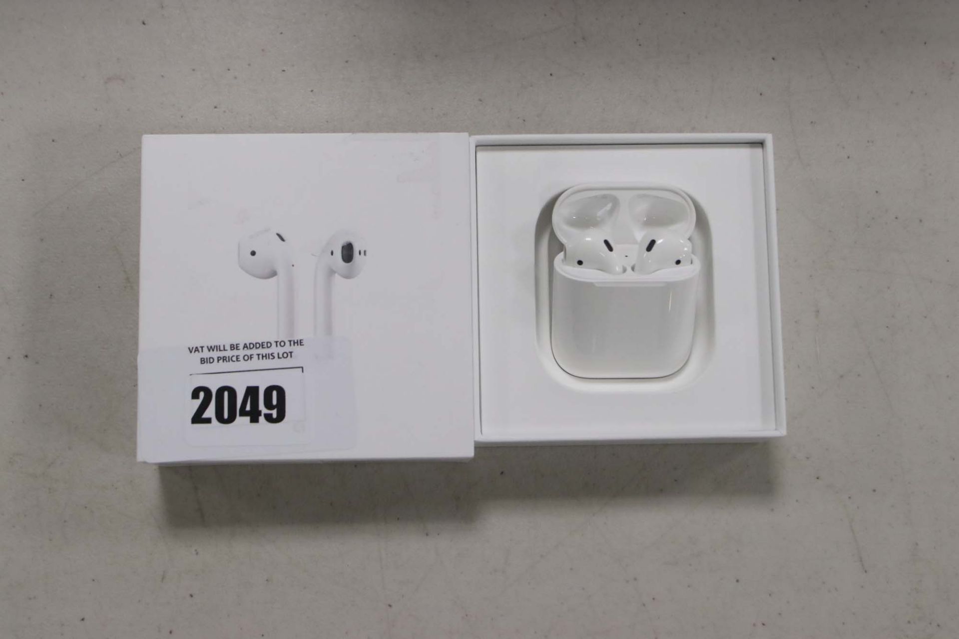 Apple AirPods with wireless charging case and box