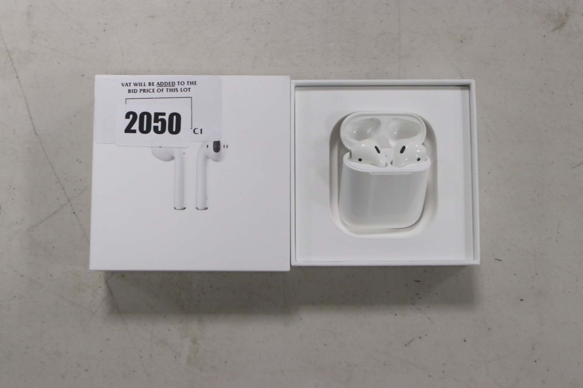 Apple AirPods with wireless charging case and box