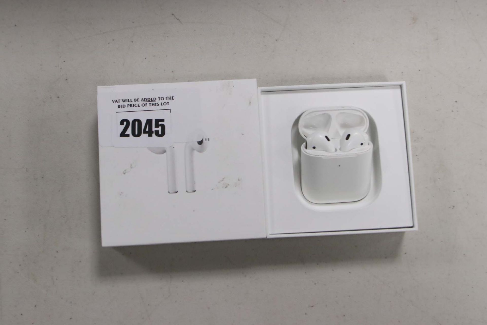 Apple AirPods with wireless charging case and box