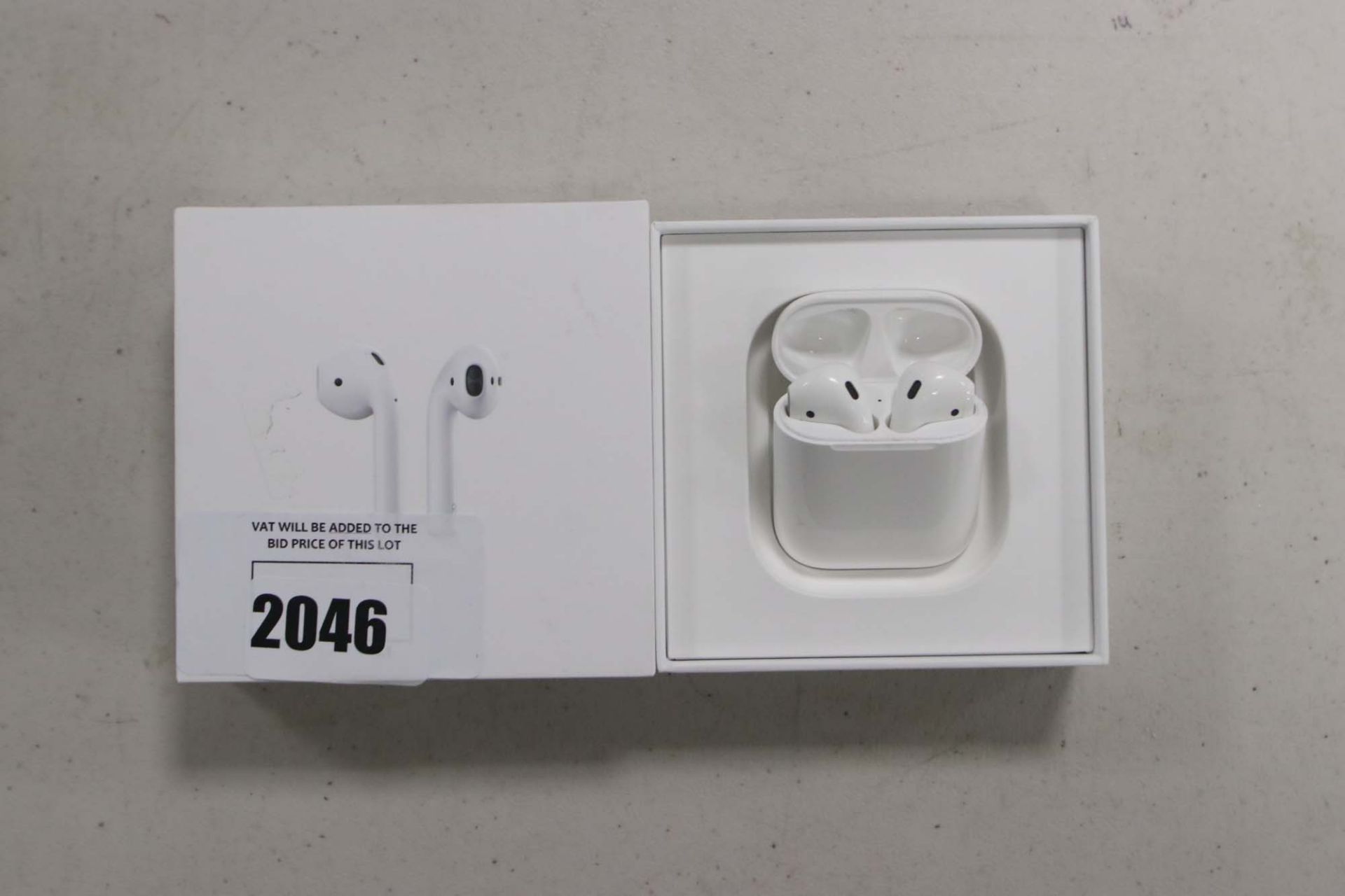 Apple AirPods with wireless charging case and box