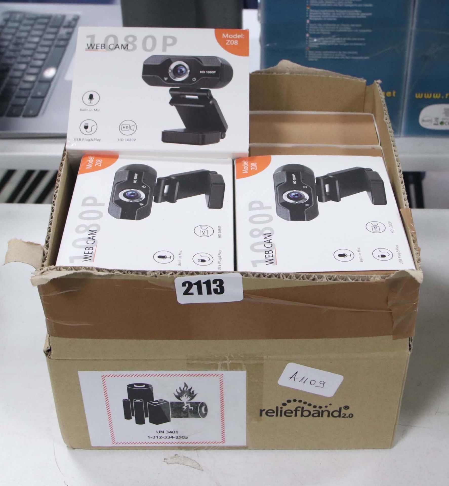 Box containing various model ZO8 1080p web cams