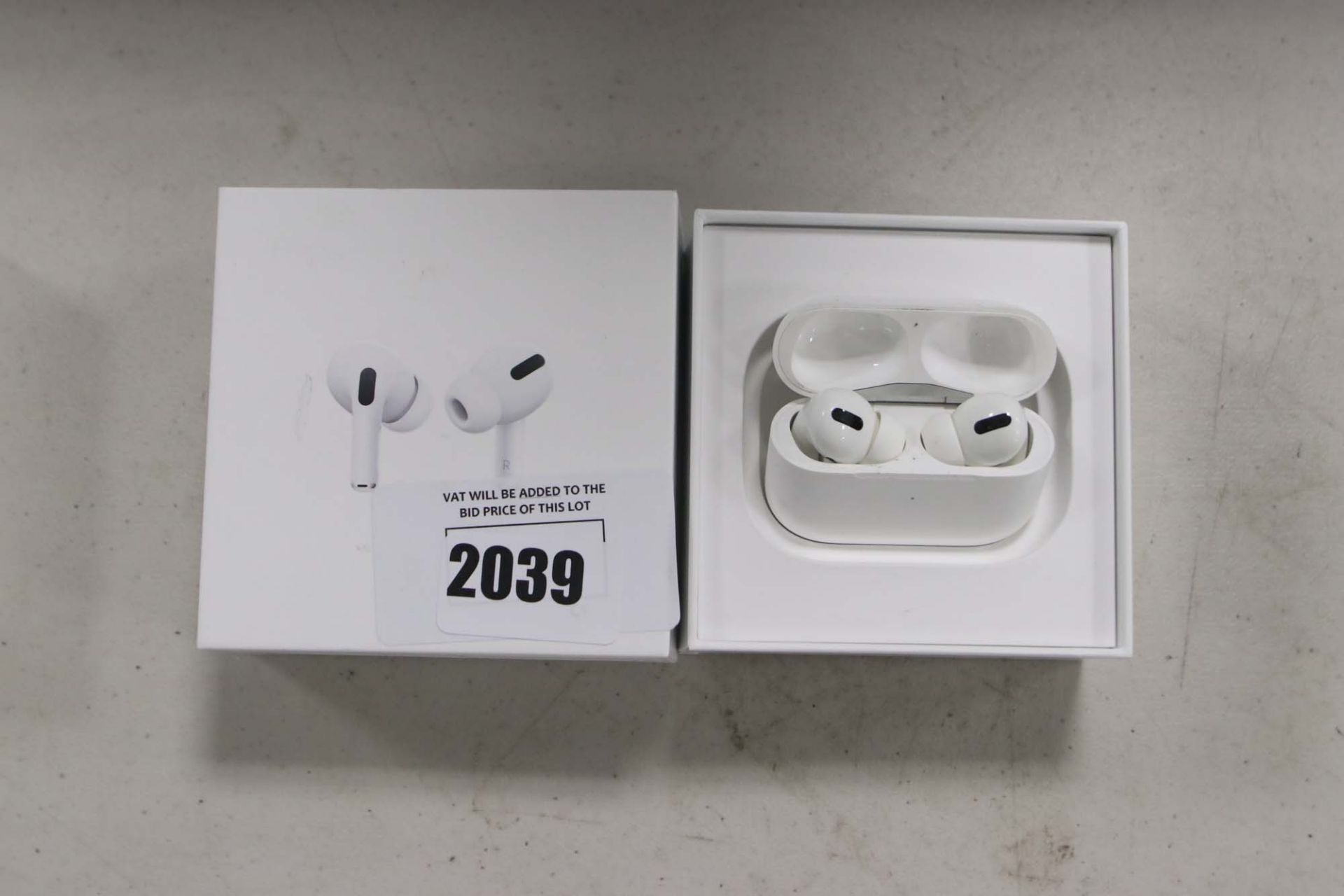 Apple AirPods Pro with wireless charging case and box