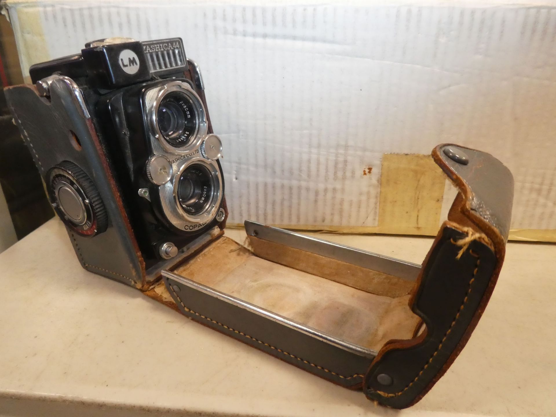 Yashica 44 TLR camera model COPAL-SV with grey leather case