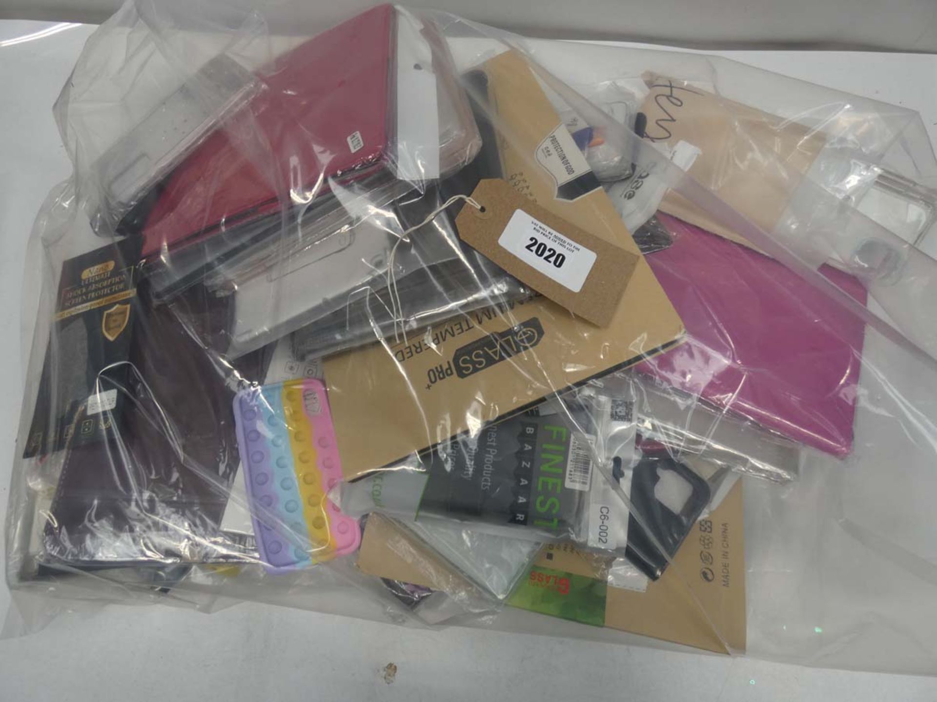 Bag containing quantity of mobile phone/tablet cases and covers