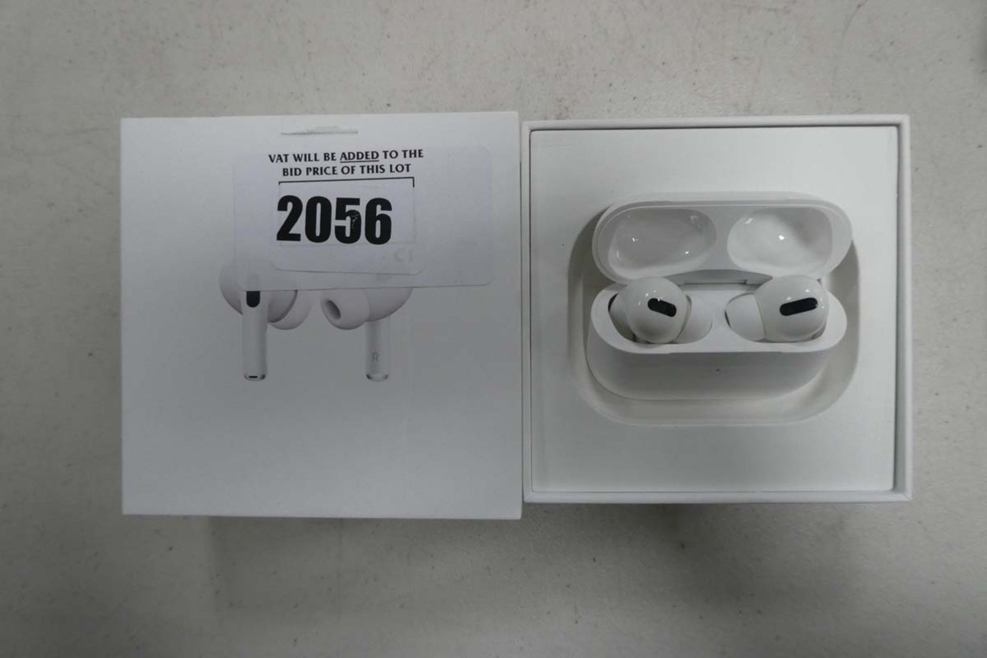Apple AirPods Pro with wireless charging case and box