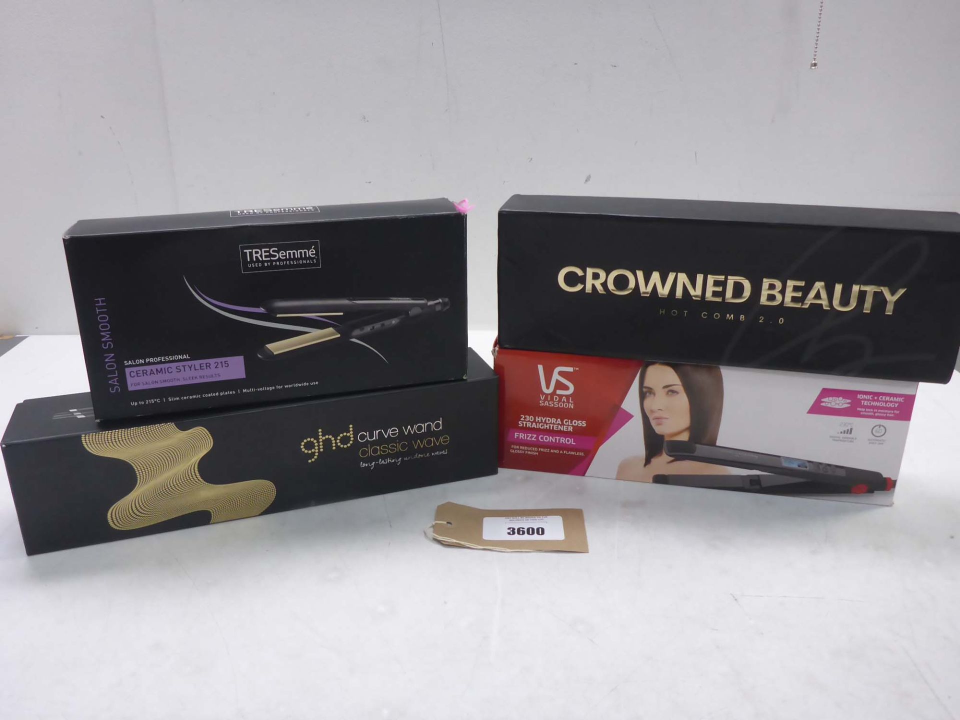 GHD curve wand classic wave, TRESemme ceramic 215 styler Vidal Sassoon hydro gloss straighteners and