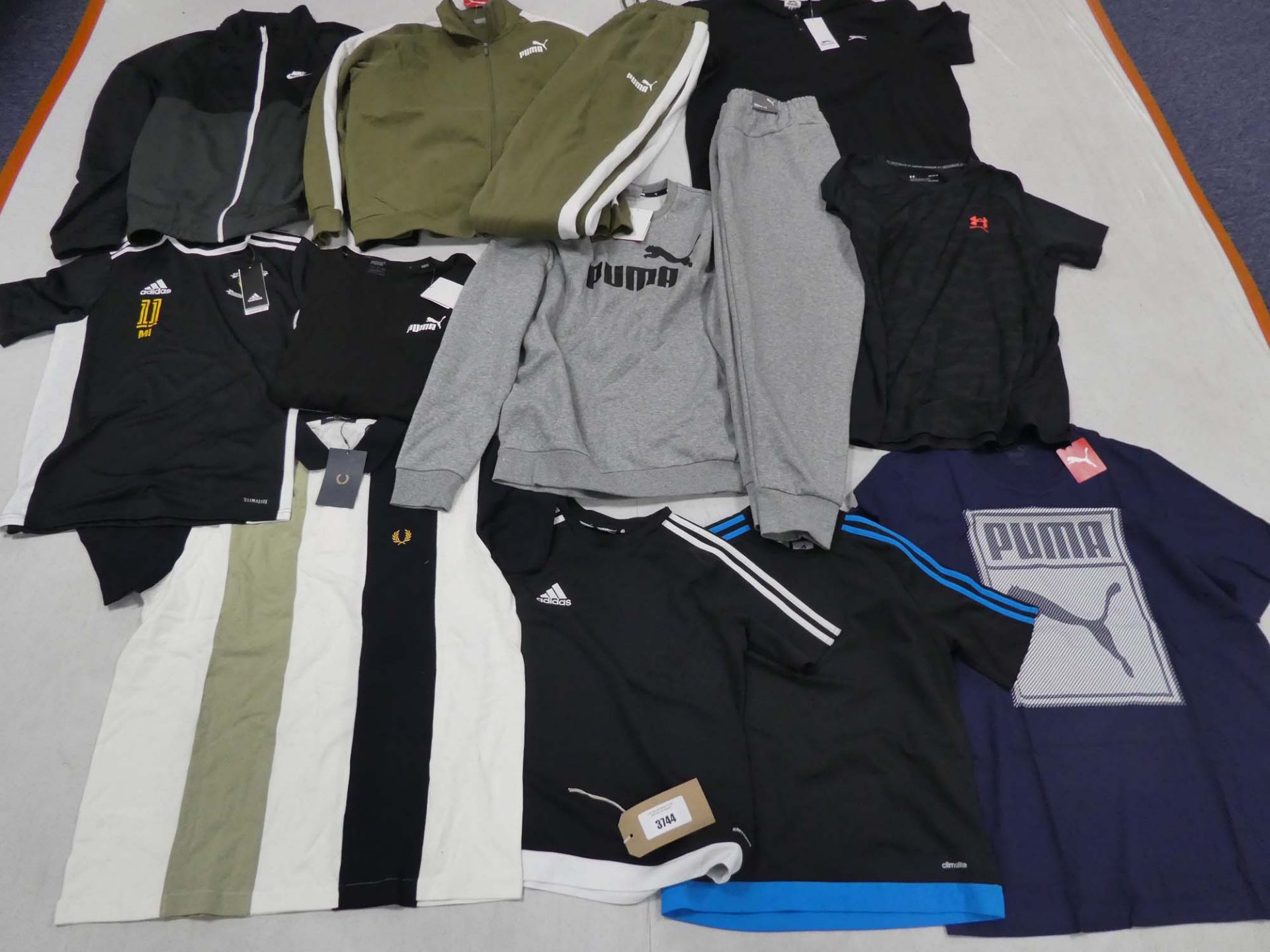Selection of sportswear to include Puma, Adidas, Nike, etc