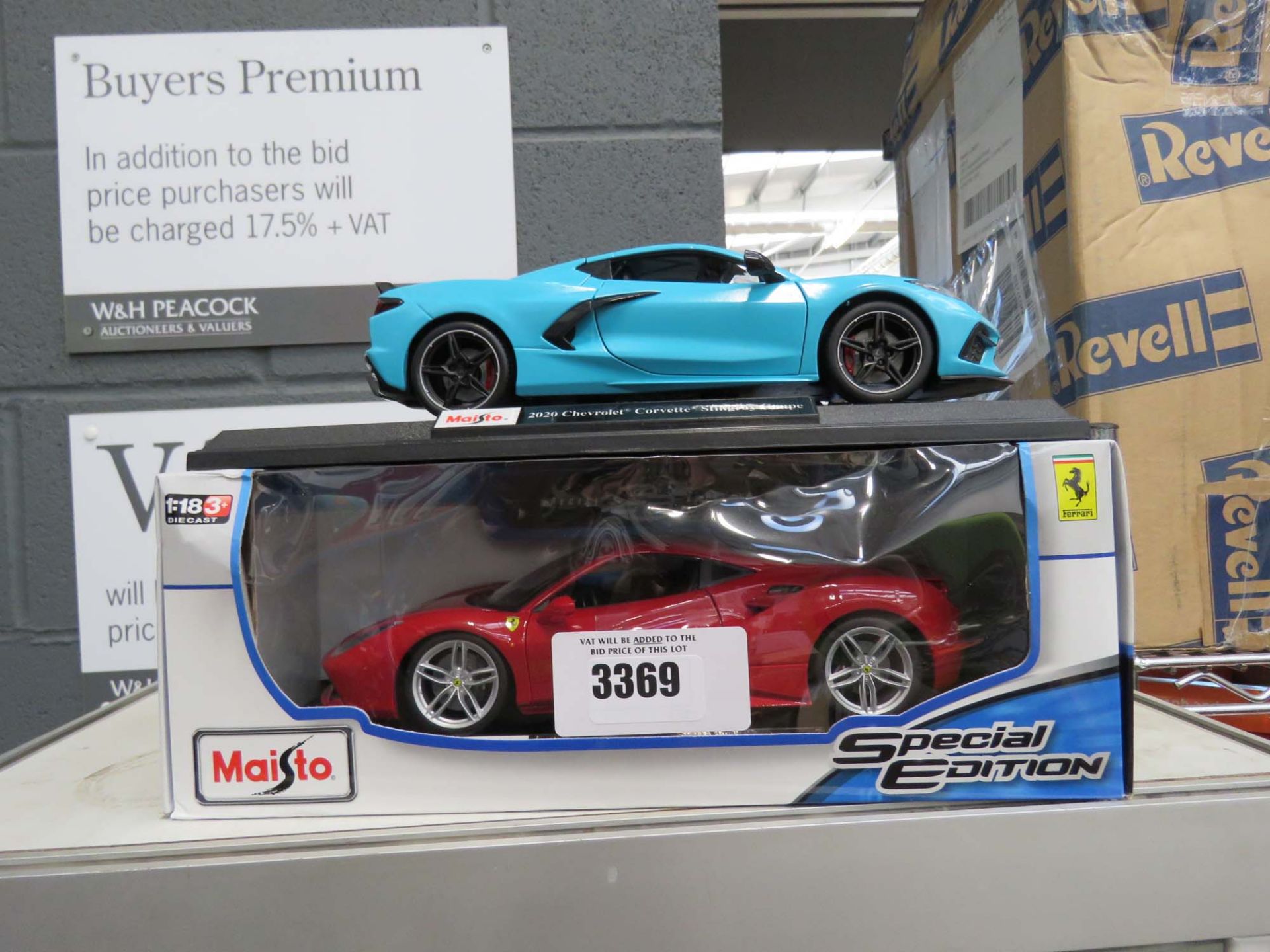 1 boxed and 1 unboxed special edition model cars