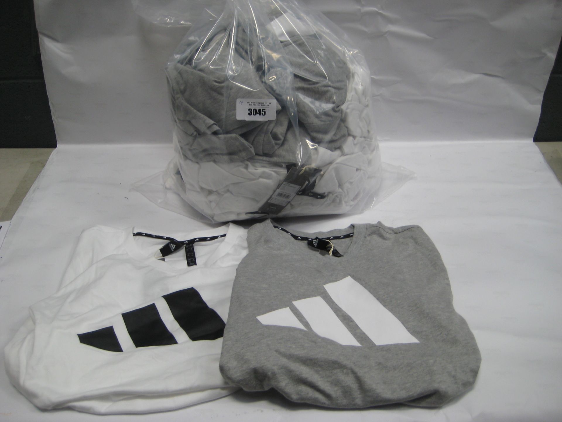 Bag containing 19 mens Adidas t-shirts in white and grey, sizes L and bigger