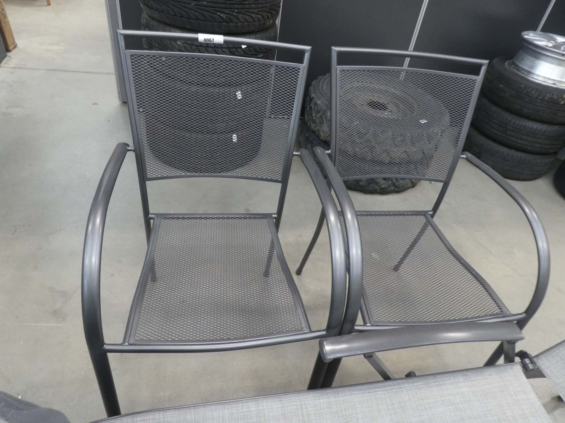 2 steel mesh stacking garden chairs