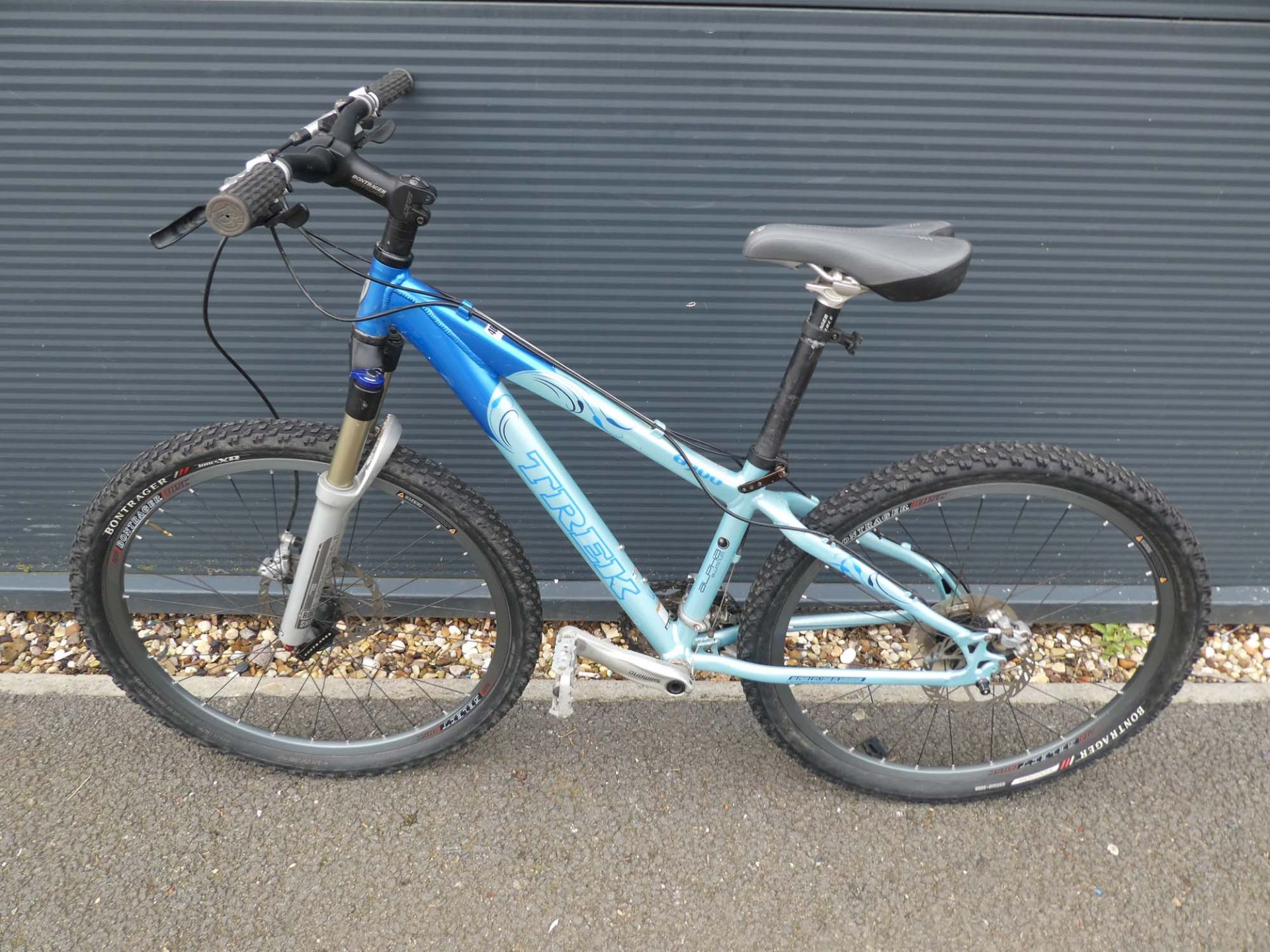 Trex mountain bike in pale blue/ dark blue